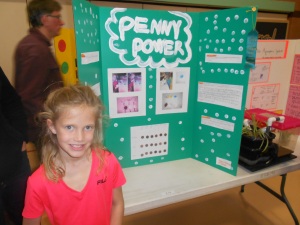 My best gal - who loves art so much that the Science Fair project was not complete without polka-dots and a flower border.